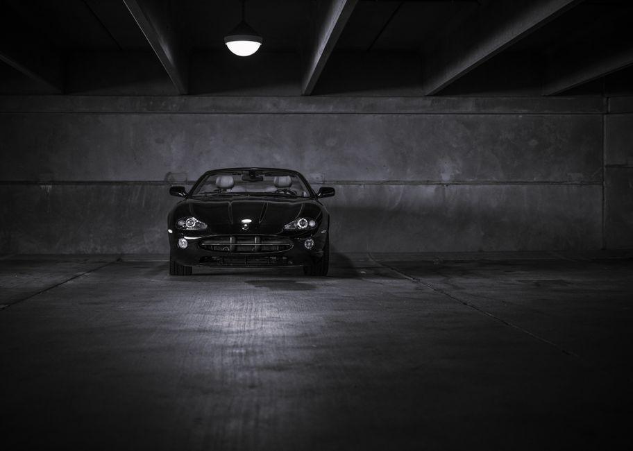 Alessandro Isola Shapes Italian Automotive Sanctuary with Black Resin and Steel