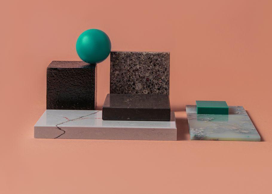 EWE Studio Unveils Exhuma: A Hand-Carved Green Marble Dining Table Paired with a Cast Aluminum Base